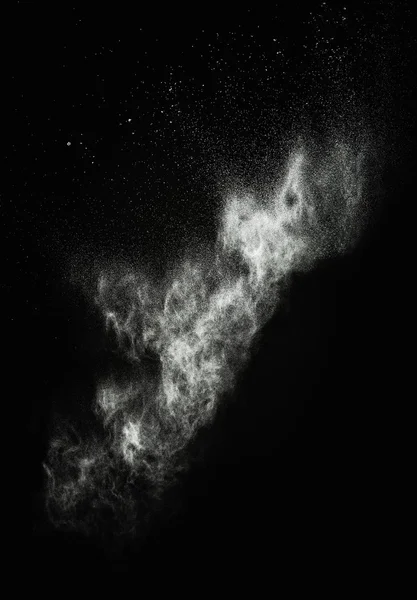 White powder exploding isolated on black — Stock Photo, Image