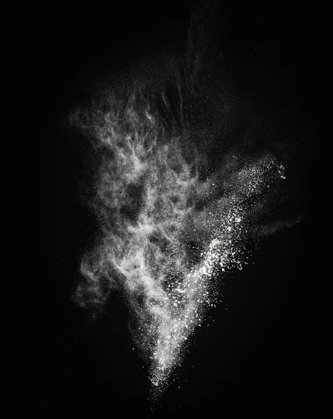 White powder exploding isolated on black — Stock Photo, Image