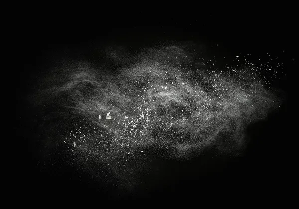 White powder exploding isolated on black — Stock Photo, Image