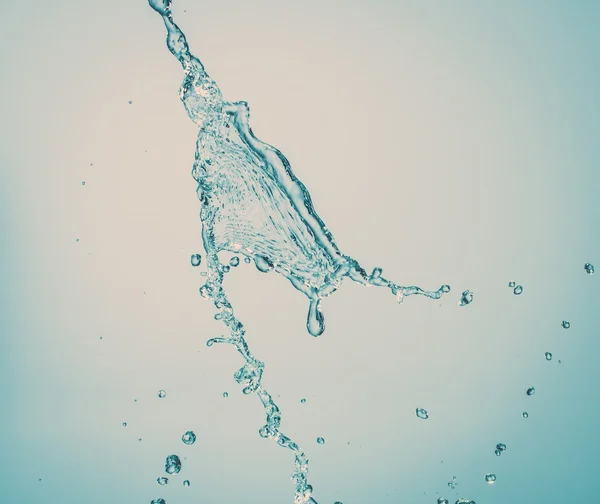 Брызги воды на изолированном фоне — стоковое фото