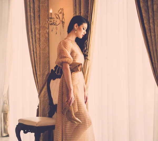 Woman near window in luxury house — Stock Photo, Image