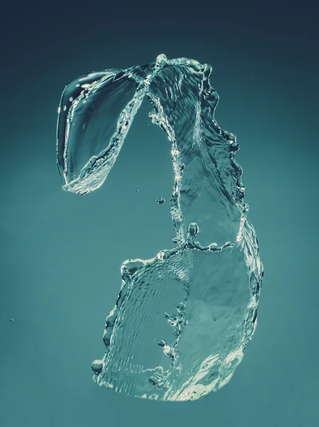 Salpicaduras de agua sobre fondo aislado —  Fotos de Stock