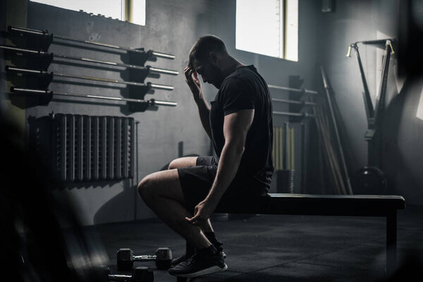 Male Take Break After Workout With Dumbbells . Royalty Free Stock Images