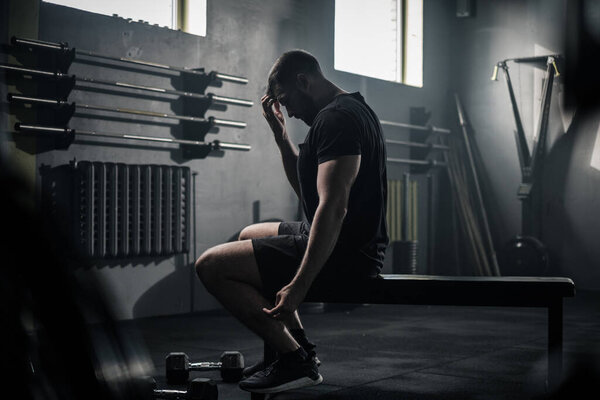 Male Take Break After Workout With Dumbbells . Stock Image