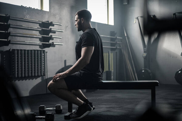 Sportsman Take Pause After Workout With Dumbbells . Stock Image