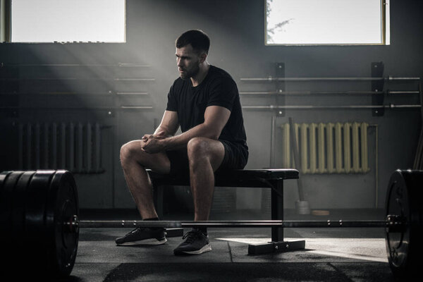 Fitness Man Stretch His Wrists After Training . Stock Picture