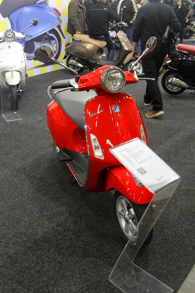 HAMBURG, GERMANY - FEBRUARY 22: The red motorscooter on February 22, 2014 at HMT (Hamburger Motorrad Tage) expo, Hamburg, Germany. HMT is a large motorcycle expo — Stock Photo, Image