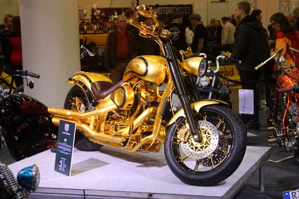 HAMBURG, GERMANY - FEBRUARY 22: The gold motorcycle on February 22, 2014 at HMT (Hamburger Motorrad Tage) expo, Hamburg, Germany. HMT is a large motorcycle expo — Stock Photo, Image