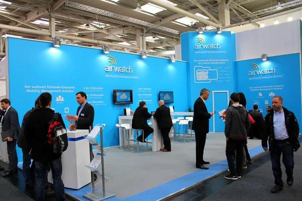 HANNOVER, GERMANY - MARCH 13: The stand of Airwatch on March 13, 2014 at CEBIT computer expo, Hannover, Germany. CeBIT is the world's largest computer expo — Stock Photo, Image