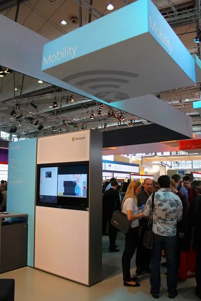 HANNOVER, GERMANY - MARCH 13: The stand of Microsoft on March 13, 2014 at CEBIT computer expo, Hannover, Germany. CeBIT is the world's largest computer expo — Stock Photo, Image