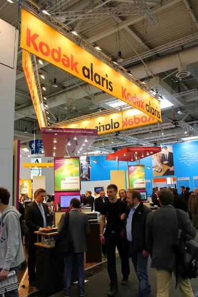 HANNOVER, GERMANY - MARCH 13: The stand of Kodak on March 13, 2014 at CEBIT computer expo, Hannover, Germany. CeBIT is the world's largest computer expo — Stock Photo, Image