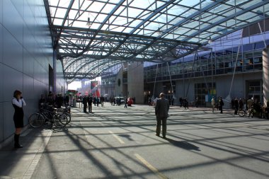 HANNOVER, GERMANY - MARCH 13: The covered passageway between expo halls on March 13, 2014 at CEBIT computer expo, Hannover, Germany. CeBIT is the world's largest computer expo clipart