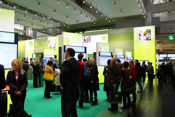 HANNOVER, ALEMANHA - 13 DE MARÇO: O stand da Datev em 13 de março de 2014 na CEBIT Computer Expo, Hannover, Alemanha. CeBIT é a maior exposição de computadores do mundo — Fotografia de Stock