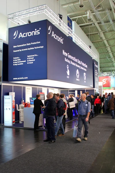 HANNOVER, GERMANY - MARCH 13: The stand of Acronis on March 13, 2014 at CEBIT computer expo, Hannover, Germany. CeBIT is the world's largest computer expo — Stock Photo, Image