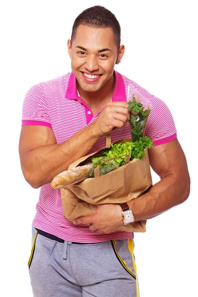 Portrait of sexy man posing in grosery — Stock Photo, Image