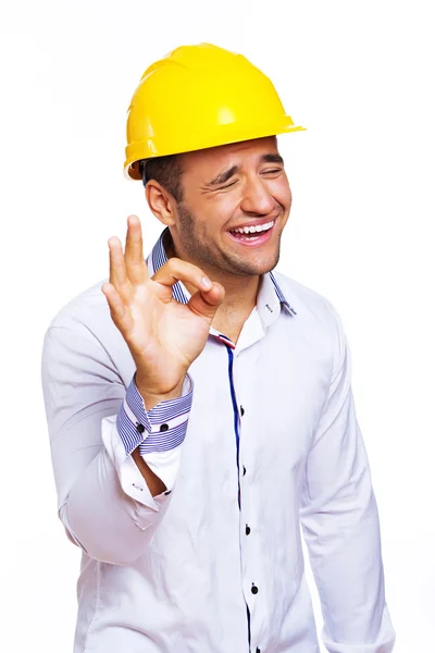 Portrait of sexy worker posing in studio in helmet — Stock Photo, Image