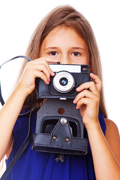 Porträtt av vackra flicka poserar på vit bakgrund med kamera — Stockfoto