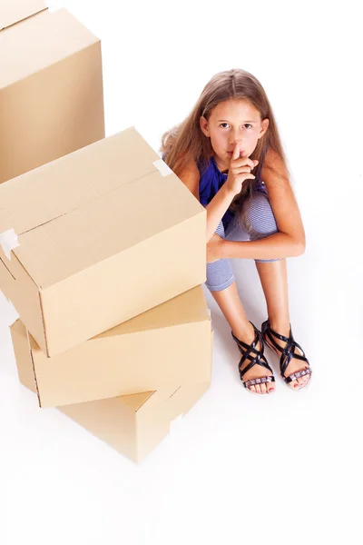 Portrait of beautifu girl posing on white background with box — Stock Photo, Image