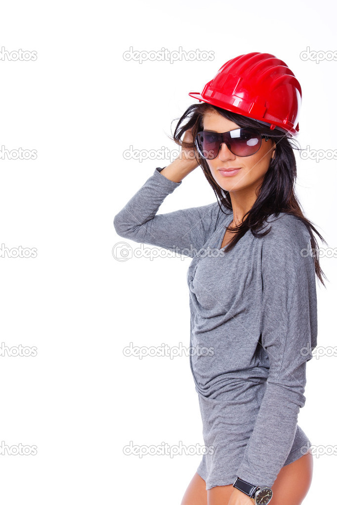 Portrait of beautiful worker posing on white background