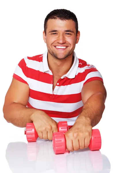 Portrait of sexy woman posing in studio with dumbbells — Stock Photo, Image