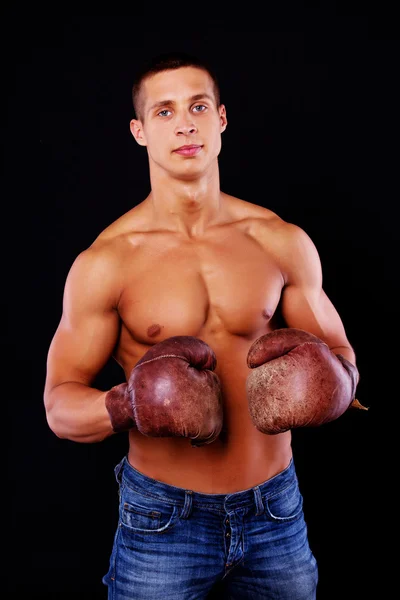 Un atleta in uno studio — Foto Stock