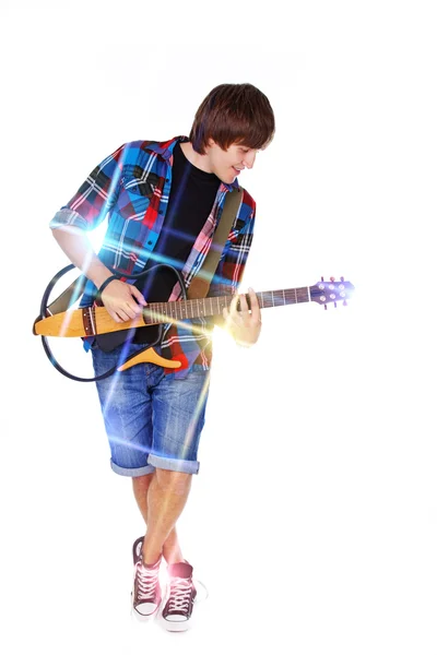 Portrait of young rocker posing in studio on white background — Stock Photo, Image