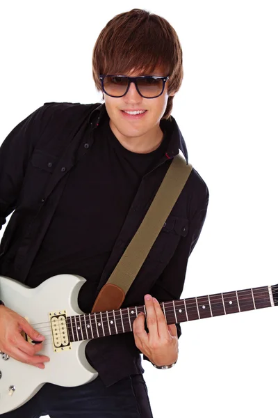 Portrait of young rocker posing in studio on white background in — Stock Photo, Image