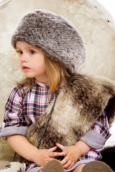 Portrait of beautiful girl posing on white background in fur — Stock Photo, Image