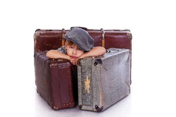 Portrait of little boy posing on white background with bag — Stock Photo, Image