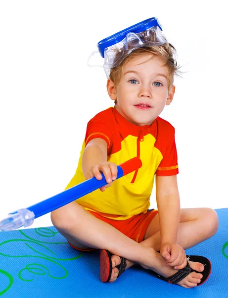 Portrait of handsome kid posing on white background in pool — Stock Photo, Image