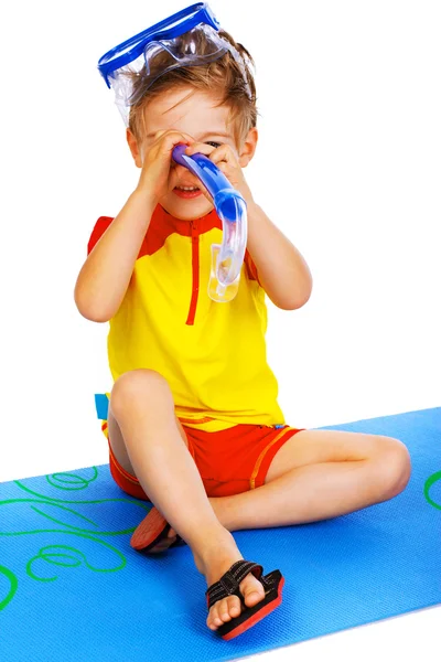 Portrait of handsome kid posing on white background in pool — Stock Photo, Image