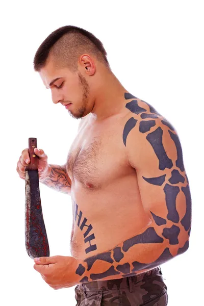 Muscular male with a knife — Stock Photo, Image