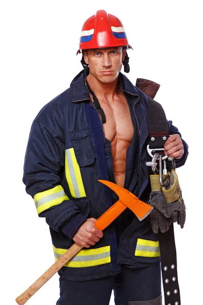 Retrato del hombre guapo posando sobre fondo negro en el bombero c —  Fotos de Stock