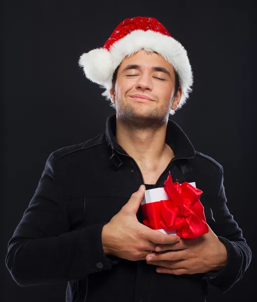 Retrato de homem bonito posando no fundo preto — Fotografia de Stock