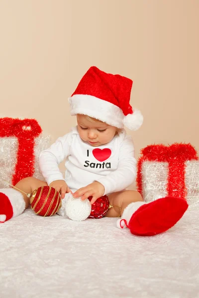 Portrait of young child posing on beige background — Stock Photo, Image