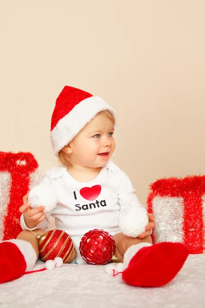 Portrait of young child posing on beige background — Stock Photo, Image