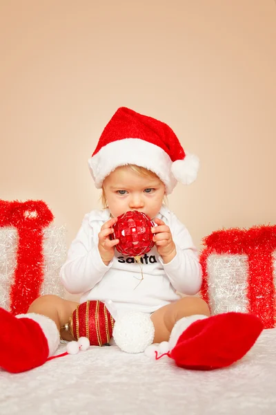 Portrait of young child posing on beige background — Stock Photo, Image