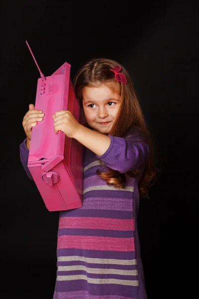 Uma menina com um saco escolar — Fotografia de Stock