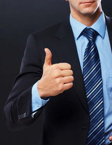 Man is posing on the floor with a gun — Stock Photo, Image