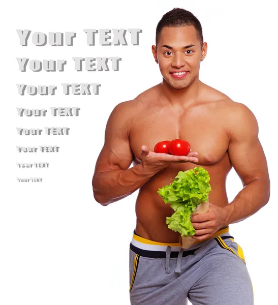 Hombre está posando con verduras —  Fotos de Stock