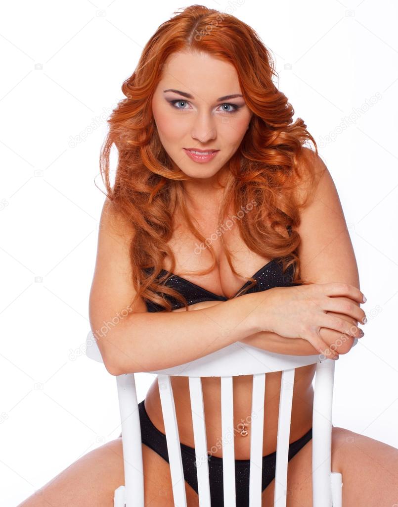 Redhead woman in dark underwear