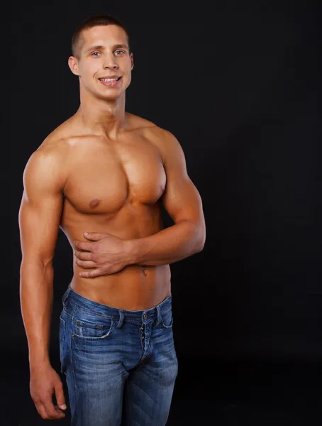 Half naked fit man is posing on camera — Stock Photo, Image