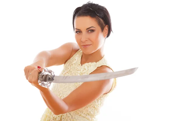 Elegant model is posing with sword — Stock Photo, Image