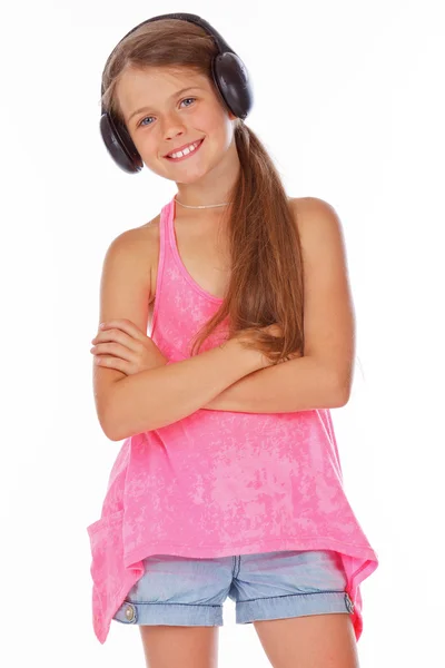 Little girl with headphones in her head — Stock Photo, Image