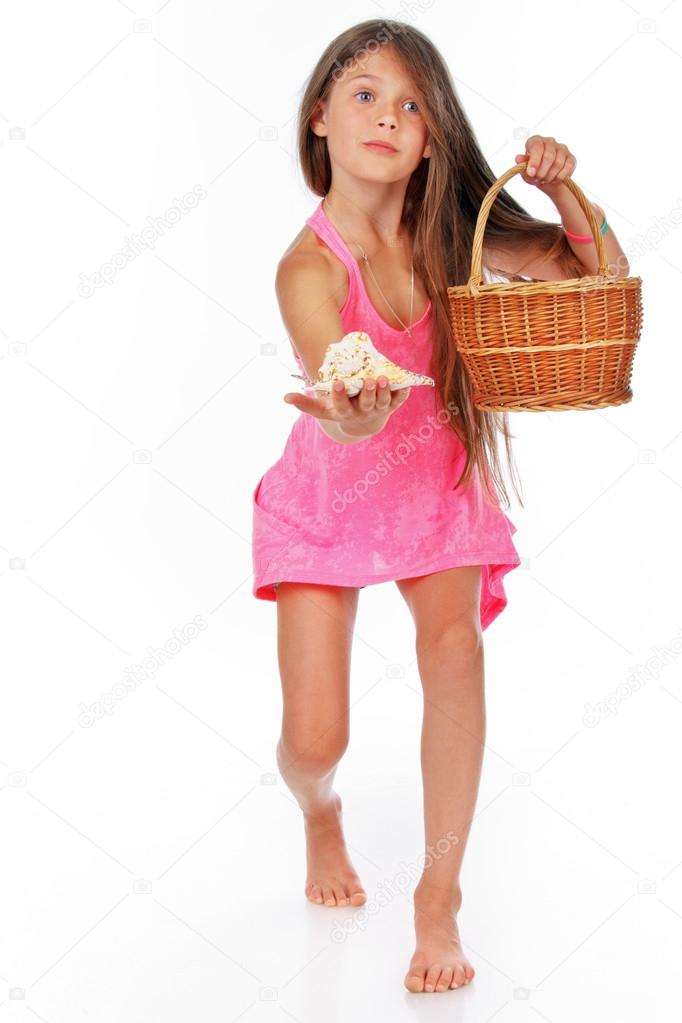 Little girl took shell out of basket