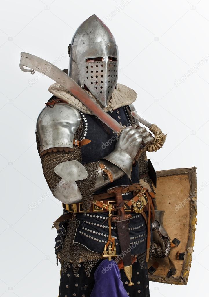 Man is posing as a medieval knight