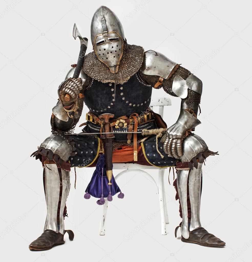 Proudly sitting knight is holding his weapon