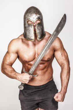 Shirtless barbariant with angry smirk clipart