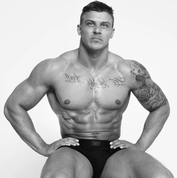 Colorless photo of hot guy with sexy body — Stock Image Colorless photo of hot guy with sexy body Royalty Free Stock Photos