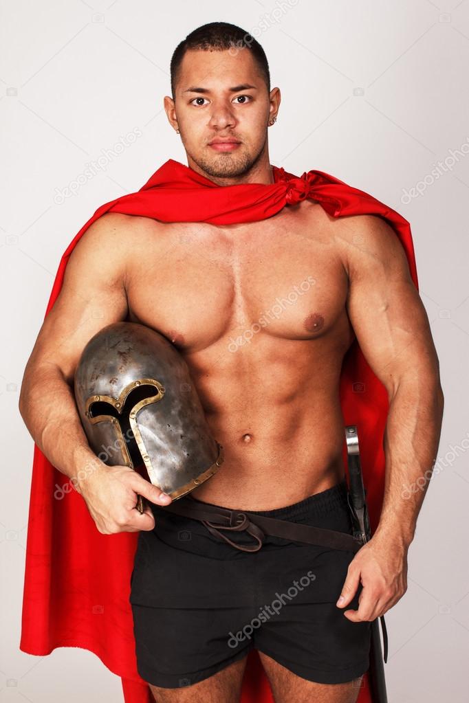 Brave barbarian who is holding his helmet